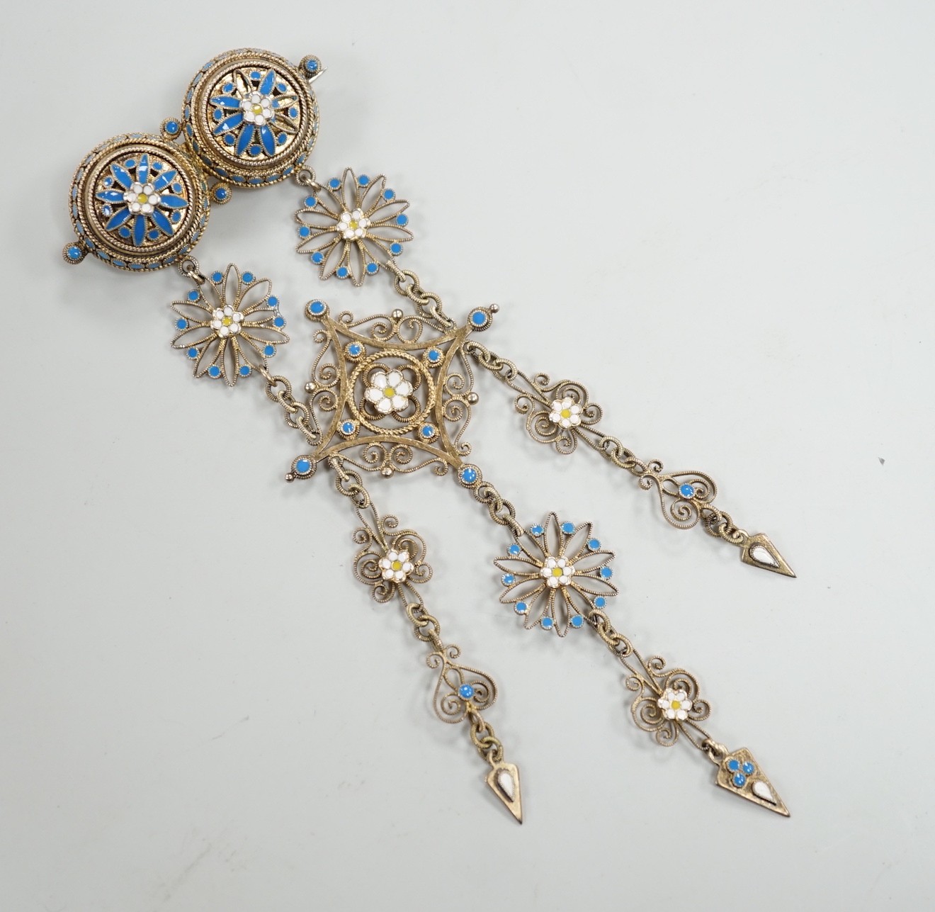 An early 20th century Scandinavian 830s gilt white metal and three colour enamel set drop brooch, 11cm, gross weight 16.3 grams.